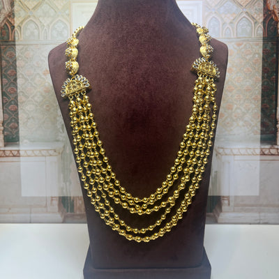 Gold Beaded Haar
